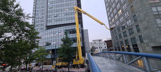 Wumag Arbeitsbühne Wumag WT 1000 bei Arbeiten in der Innenstadt